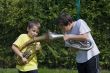 brothers playing on the  horn