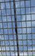 blue skies through windows of business center