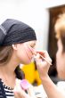 Preparing make up to actress before scene #3