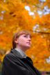 Woman look forward in autumn park #2
