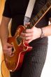 Musician play on guitar #1