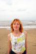 Young woman on sea beach