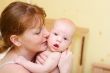 Mother gently holding baby in hands #4