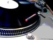 grunge dj turntable needle on record