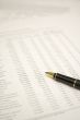 financial report and pen