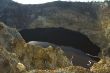 black lake in volcano crater, kelimutu, flores, indonesia