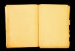 old book with blank pages over black background