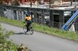 Bicyclist on 	Burke 	Gilman bike trail
