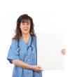 Female doctor holding the blank placard