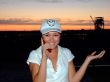 The young smiling girl talks by a mobile phone 2