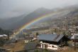 Rainbow across alpine village