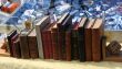 Piles of old books for sale