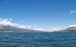 Lake surrounded by mountains in the summer