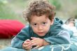 young boy on a mattress