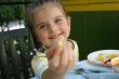 Girl eating french potato