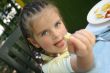 Girl eating french potato