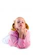 young girl is blowing a kiss