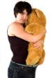young womanl cuddling with teddybear
