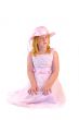 girl sitting in pink dress
