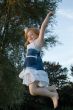 girl jumping and cheering