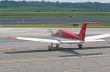 Red and White Plane Parking