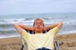 young man on sea beach in longue