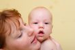 Mother gently holding baby in hands #2