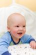 Enjoying baby on bed