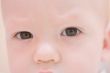 Serious baby face. Eyes close-up
