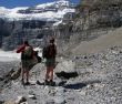 Hikers look out on valley