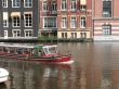 The boat on the canal Amsterdam
