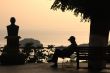 MAN SITTING ON A BENCH