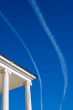white columns over blue sky background