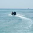 fisherman in a longtail boat