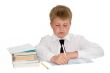 young boy studying