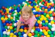 girl with varicoloured balls