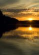 sunset over the lake and forest