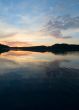 sunset over the lake and forest