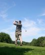 Man playing golf