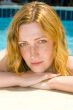 beautiful girl relaxing at the pool
