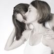 Kissing her neck