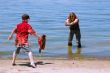 Mother and Son playing at the beach