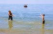 Mother and Son playing at the beach
