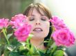 Happy woman with roses
