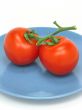 Two red tomatoes