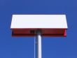 Blank billboard over blue sky