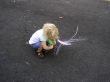 Girl Drawing with Chalk