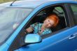 Young woman in a car