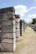 Ancient Stone Columns on the blue sky.