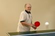Grandfather playing ping pong